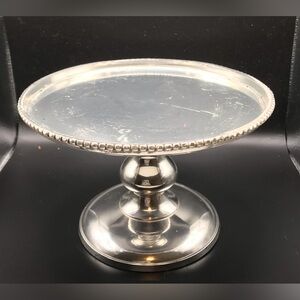 Silver tone candle holder riser vignette